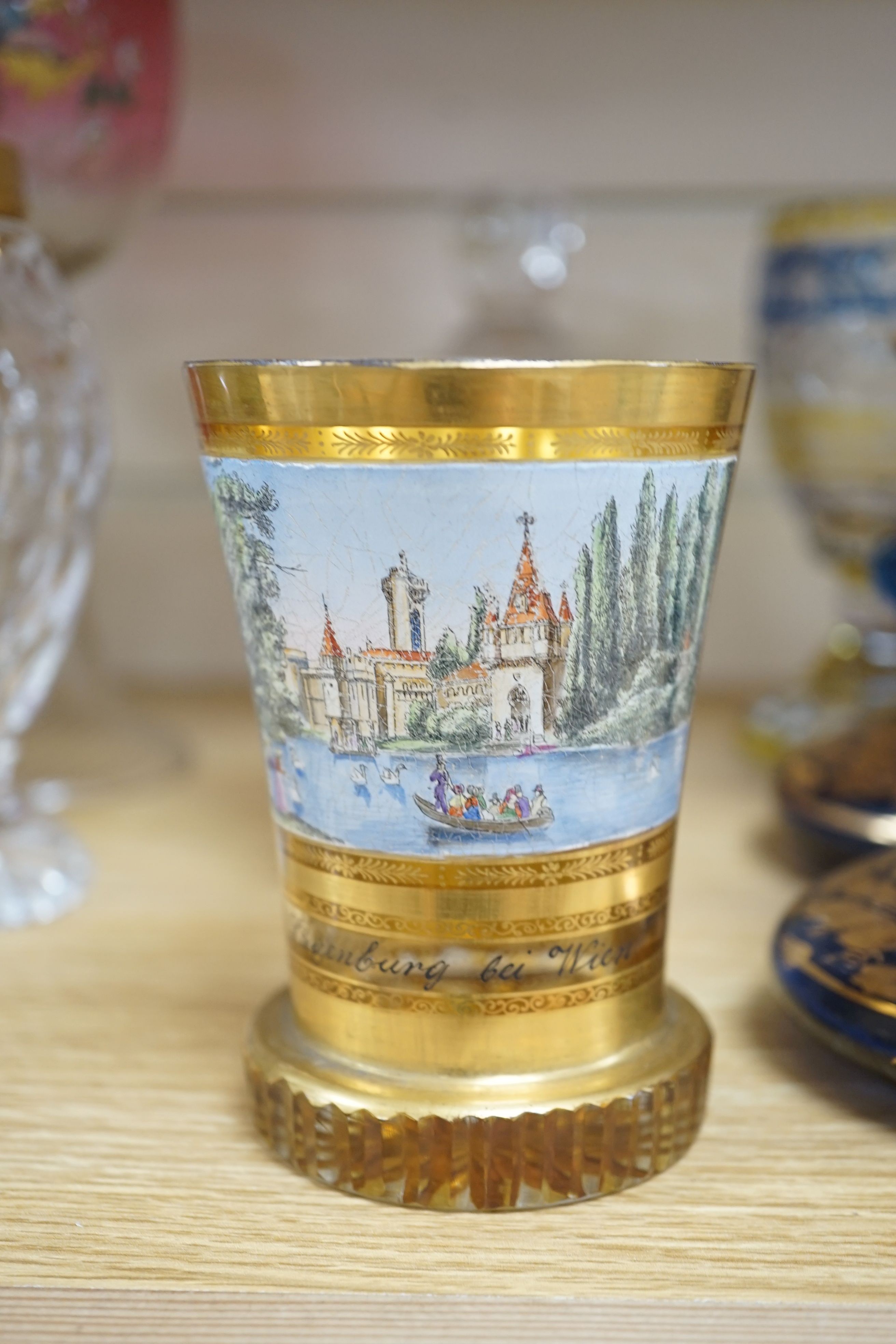 A wheel engraved Bohemian blue and yellow glass goblet, a similar gilded beaker in the manner of Anton Kothgasser, other bohemian cut glass, Moser, an 18th century Dutch soda glass, etc